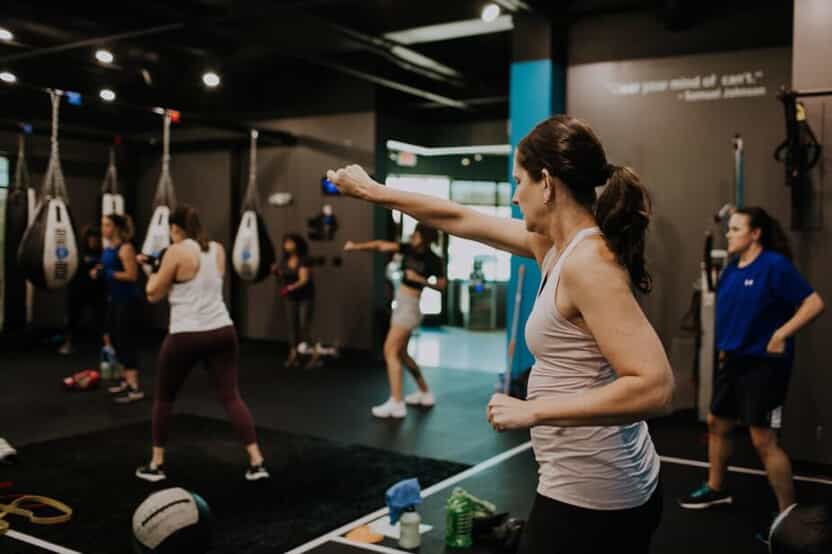 Woman practices her shadow boxing