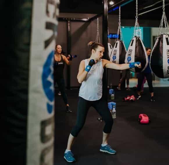 Woman practices shadow boxing