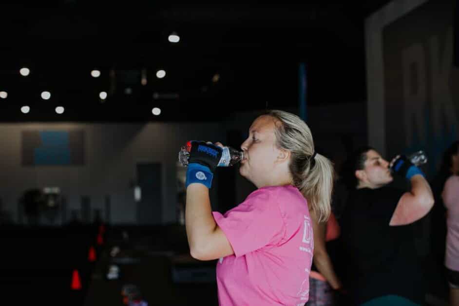 Woman takes a drink of water