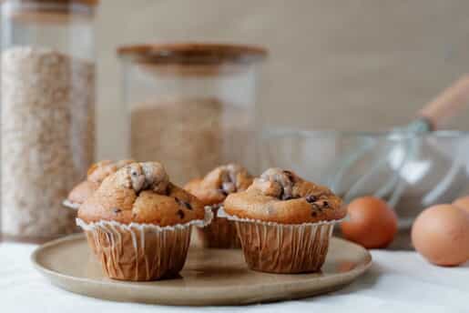 Chocolate chip muffins on a counter