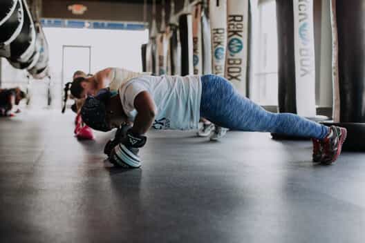 A woman performs a plank