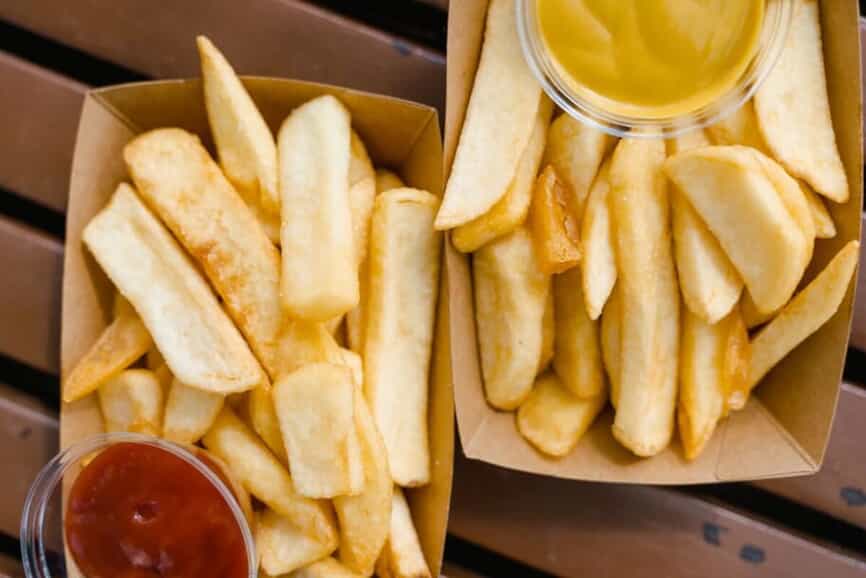 Fries with ketchup and mustard